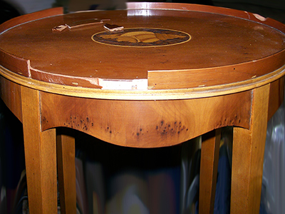 The edge banding of this table was severely damaged. The edge banding of this table was severely damaged.