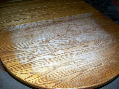 After years of service as the family table, the finish was worn and dull. After years of service as the family table, the finish was worn and dull.